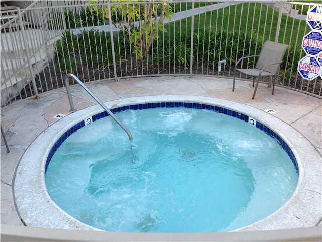 Building Photo - Charming 1-Bedroom Condo with Park-Like Views in Gated Community