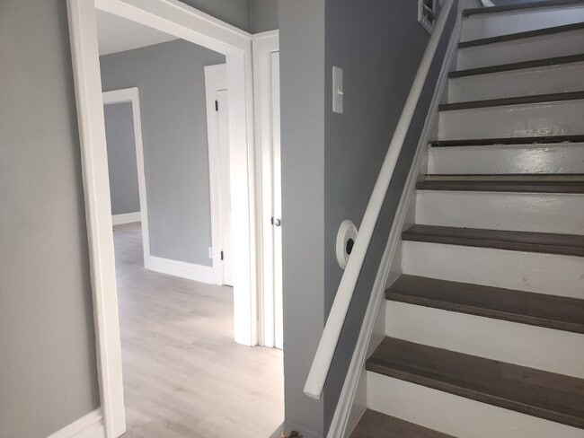 Building Photo - Charming & Spacious Updated Brick Home – P...