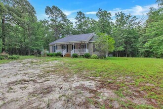 Building Photo - Charming 3-Bedroom Home on Large Acreage L...