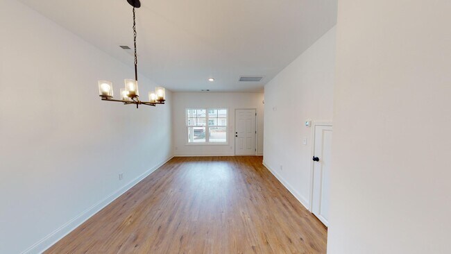 Building Photo - Charming Two Bedroom Townhomes With Flex R...