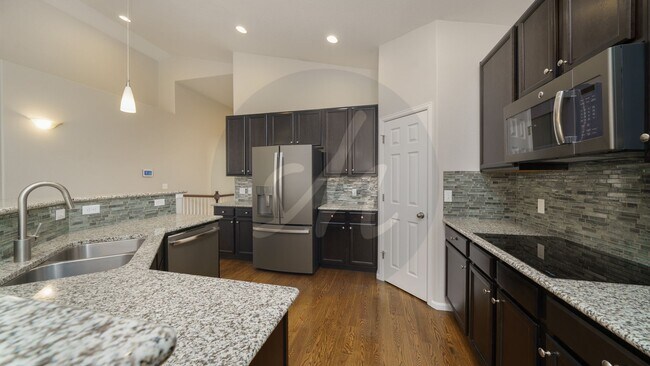 Building Photo - Spacious 4-Bedroom Home with Bonus Room and Full Basement!