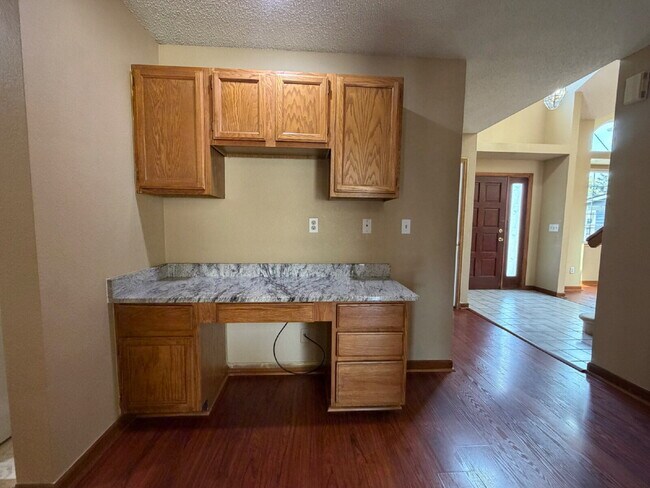 Building Photo - ~Available Now~  Beautiful Four Bedroom Home with Fireplace, Private Yard & Luxurious Primary Suite!