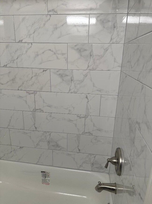 TUB TILES - 5060 N Marine Dr