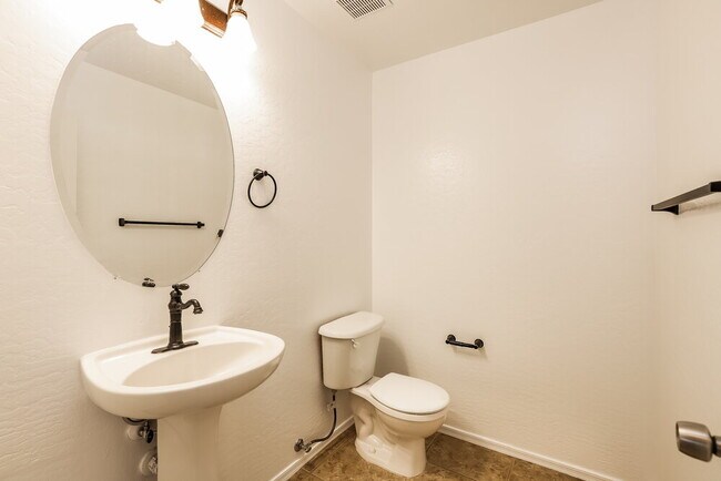 Building Photo - 12925 W Charter Oak Rd