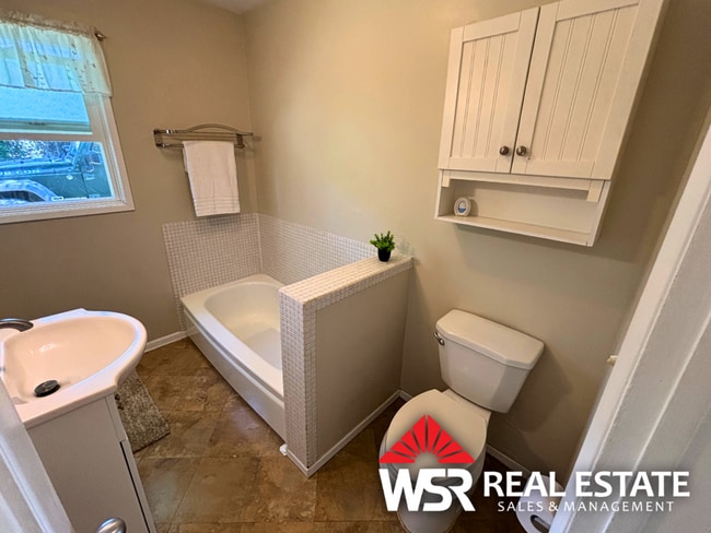 Building Photo - Move-in Ready! Utilities Included