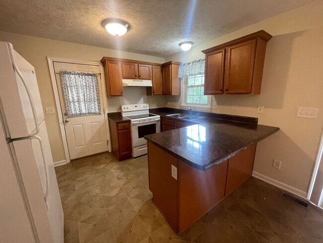 Building Photo - 5039 Coker St