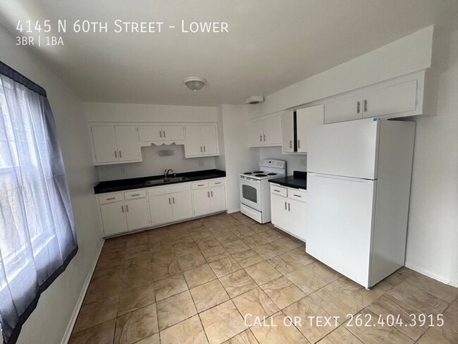 Building Photo - Spacious Rehabbed 3 Bedroom Lower Duplex