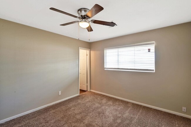 Building Photo - Remodeled property with lots of space and ...