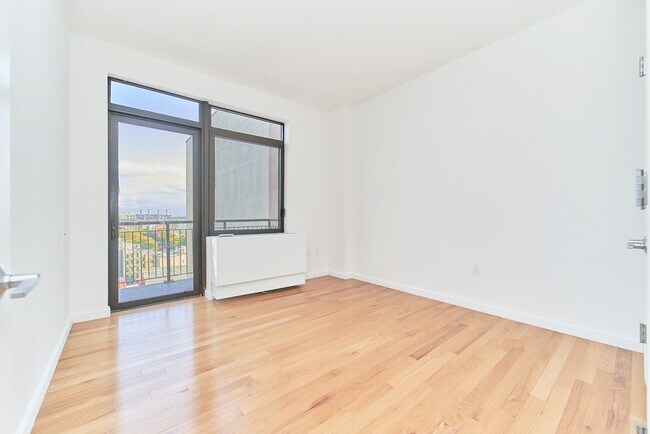 Building Photo - Gorgeous Two Bedroom with Floor to Ceiling Windows