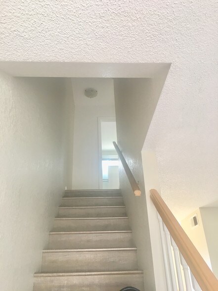 Stairwel to bedrooms and bathroom - 419 Sailfish Dr