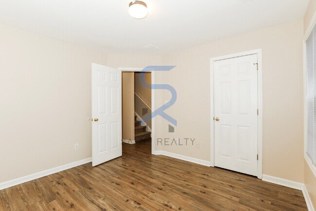 Building Photo - Move in before February 28th and choose your reward: a $250 Amazon Gift Card or a 55" Smart TV!