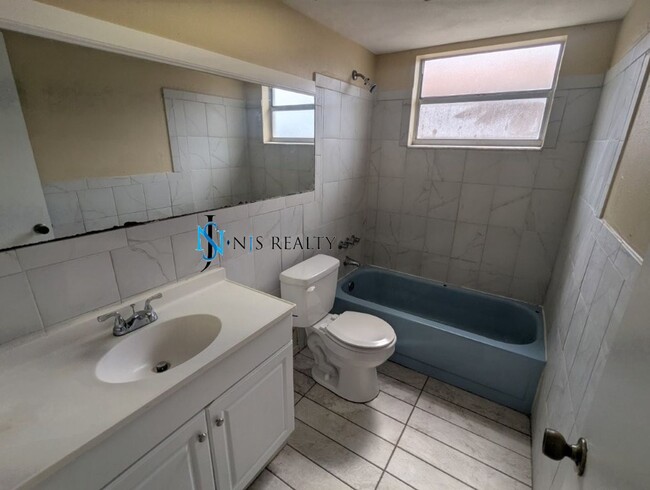 Building Photo - Section 8 available: 2/2 over 1048sf with ...