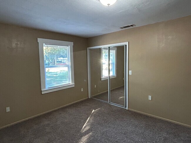 Building Photo - 3 bedroom 2 bath with bonus storage room next to Chico State with Large fenced backyard (Please r...