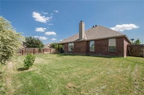 Building Photo - Former model home on corner lot is ready for move in!