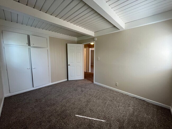 Building Photo - 2 bed 1 bath single family home with back yard and garage space