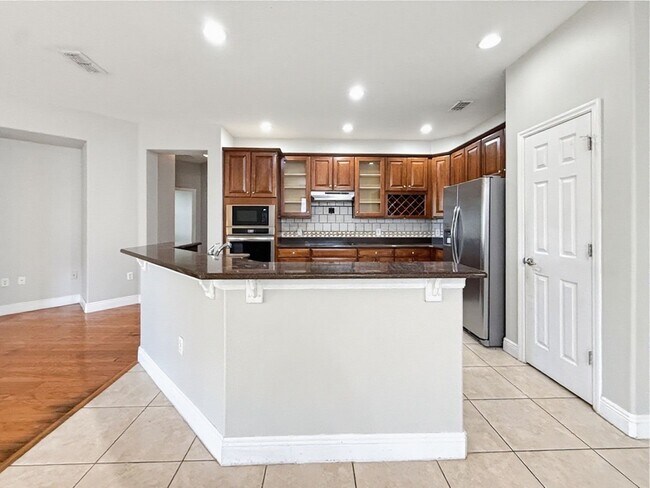 Building Photo - Waterfront 4 Bedroom Home in Eagle Creek Golf Community – Lake Nona