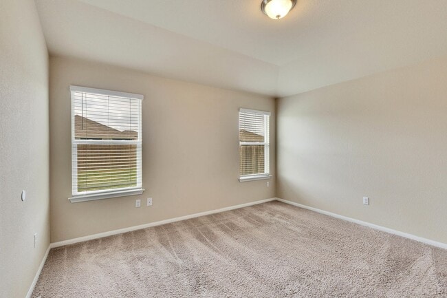 Building Photo - Modern Elegance Awaits: Discover Your Oasis in Hutto, TX