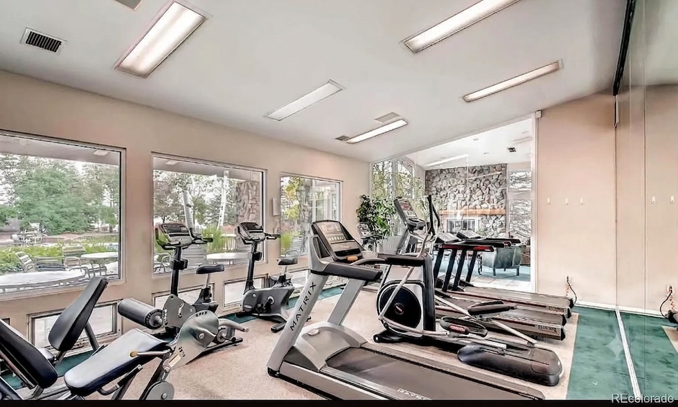 Workout facility available inside the clubhouse so it is just steps away from the unit for easy year - 8427 Thunder Ridge Way #203