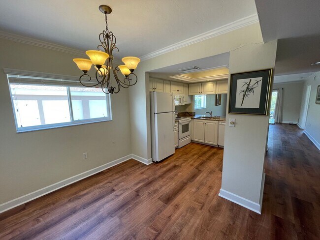 Building Photo - ANNUAL RENTAL - 3 BED / 2 BATH WITH CARPOR...