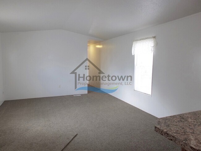 Building Photo - 2 Bed 1 Bath Mobile with Fenced Yard and Storage Shed!