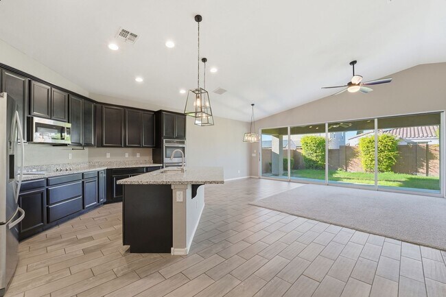 Building Photo - Stunning 4-Bed + Den Eastmark Home with Modern Upgrades Throughout