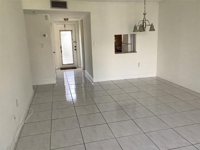 Building Photo - 8220 Sunrise Lakes Blvd