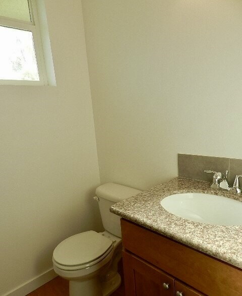 Building Photo - Updated University Place Townhome: 3 Beds, 2 Baths, Garage + Driveway Parking