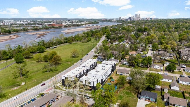 Building Photo - Discover modern elegance in the newly constructed Edgewater Condominiums, a boutique community fe...