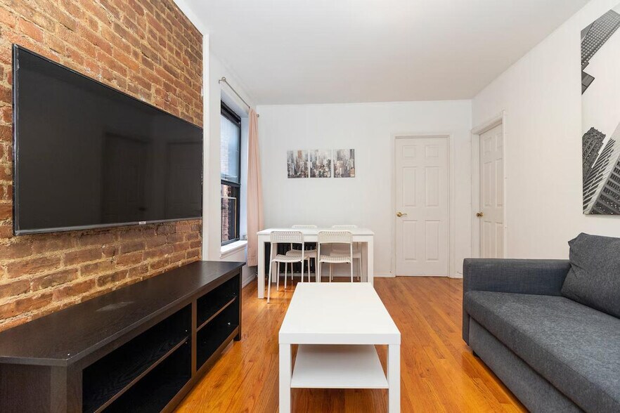 Building Photo - 309-311-311 E 95th St