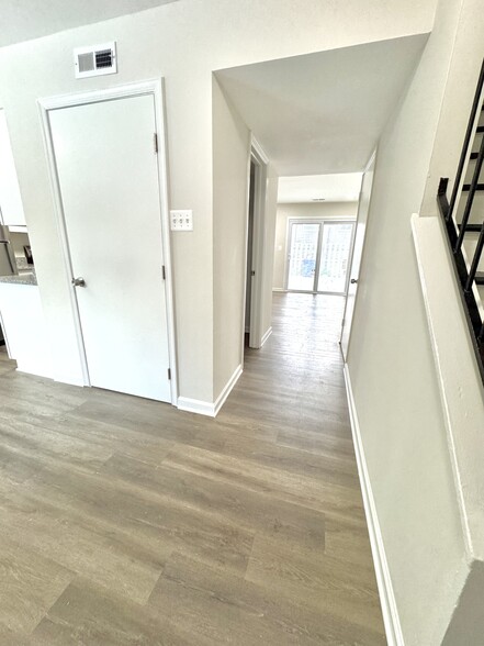 hallway leading into living room - 19649 Club Lake Rd