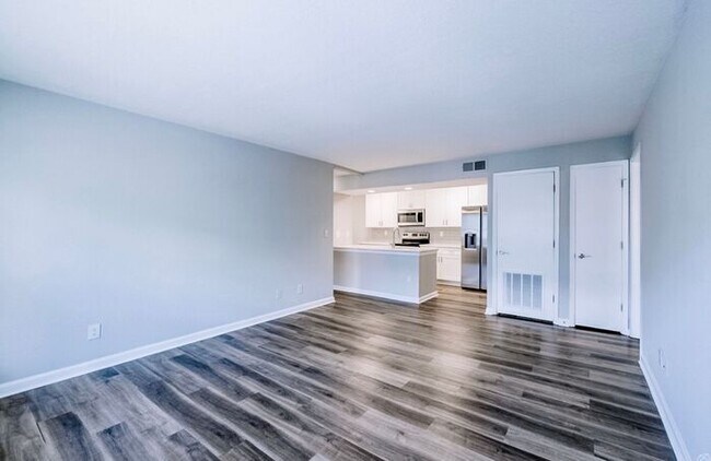Building Photo - Spacious 2-Bedroom Elite Apartment with Private Balconies & Washer/Dryer