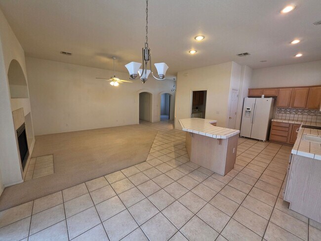 Building Photo - Spacious 3-Bedroom Home with RV Parking & 3-Car Garage in Bullhead City