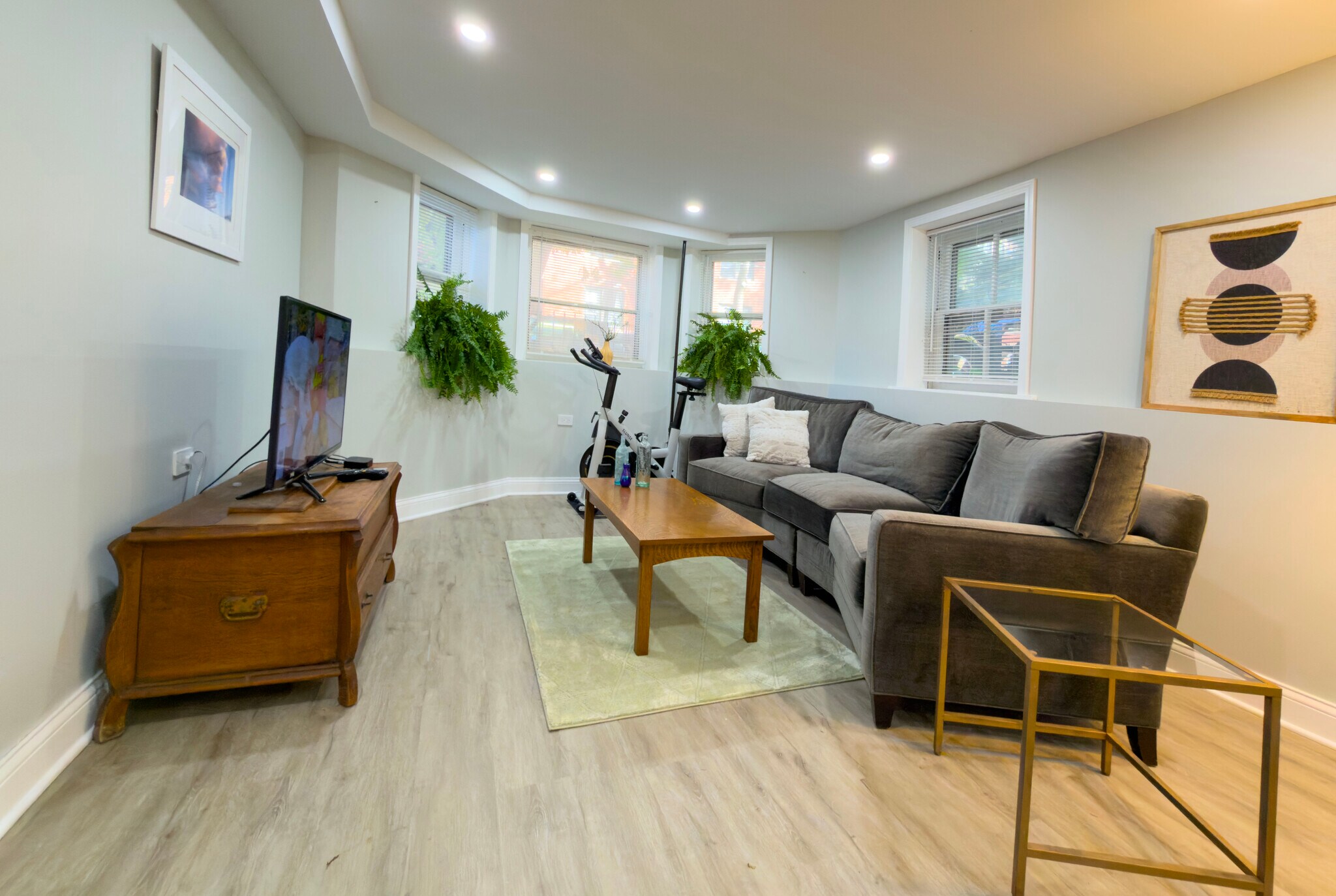 Living Area with TV and exercise bike - 952 N Hoyne Ave