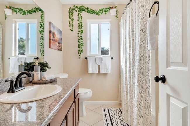 Building Photo - Boho Style 4 Bedroom 2 Bath Home, Fully Furnished