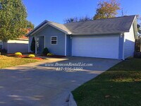 Building Photo - Large 5 Bedroom with lawn care and a commu...