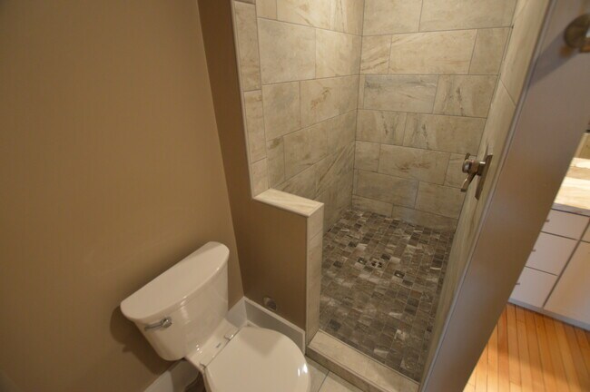 walk-in tiled shower - 604 Main Ave