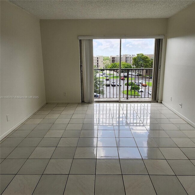Building Photo - 8550 N Sherman Cir