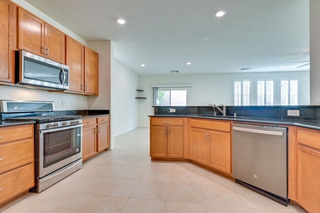 Building Photo - Green Valley!! Gated!! 4 Bedrooms!! Bed & Bath Downstairs!!  TANKLESS WATER HEATER!!! Covered pat...