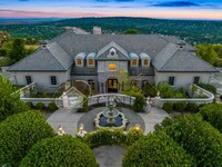 Building Photo - Palatial Executive Home in Custom Guard Ga...