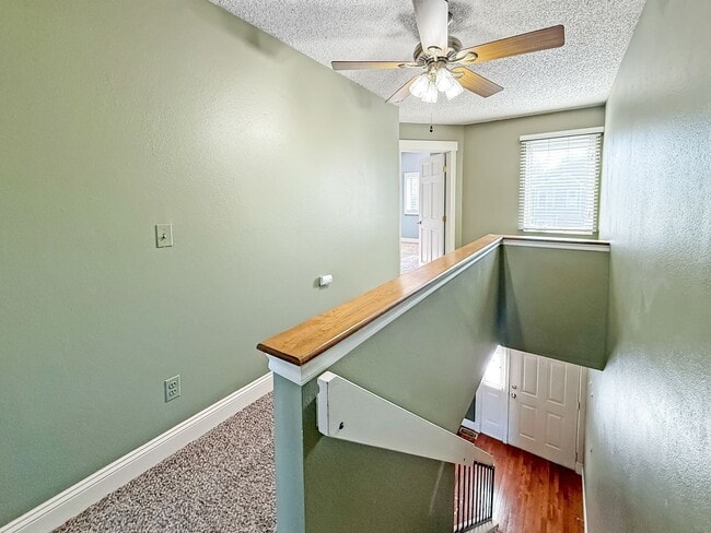 Building Photo - $0 DEPOSIT OPTION. CHARMING TWO-STORY TOWNHOUSE WITH FINISHED BASEMENT, GARAGE, AND HOA AMENITIES...