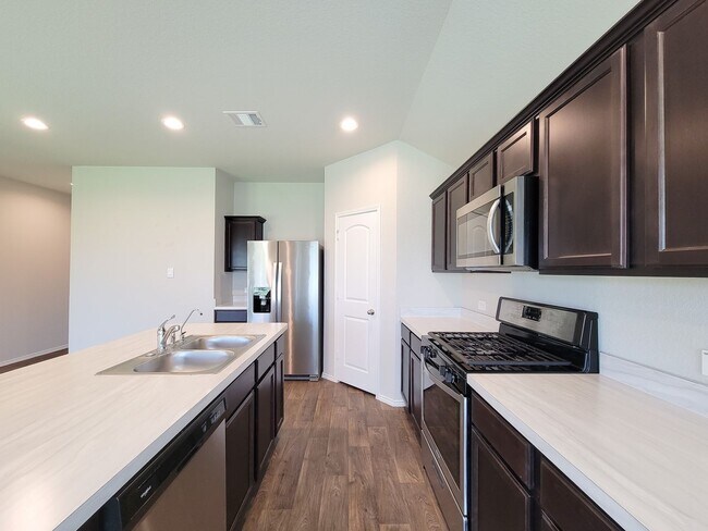 Building Photo - The price is right and the location is even better! Take a look TODAY at this like-new, 3/2, open...