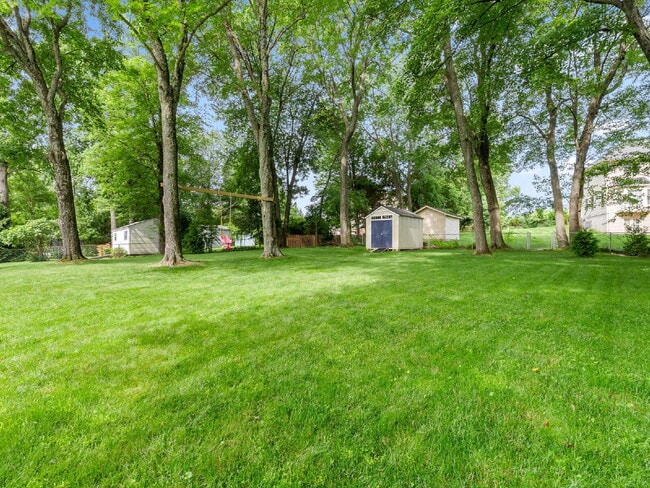 Building Photo - Beautifully Updated Home with Finished Lower Level, Fenced Yard & Exceptional Outdoor Living