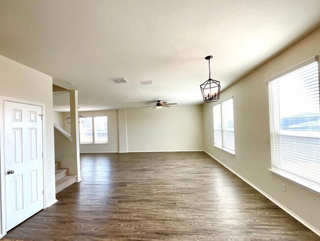 Building Photo - AVAILABLE NOW- Energy-Efficient 4/3 Home with Solar Panels & Pool Access!