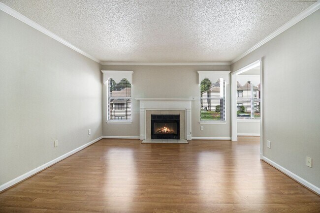Building Photo - Sunlit 2BD/2BA with Fireplace in Peaceful ...