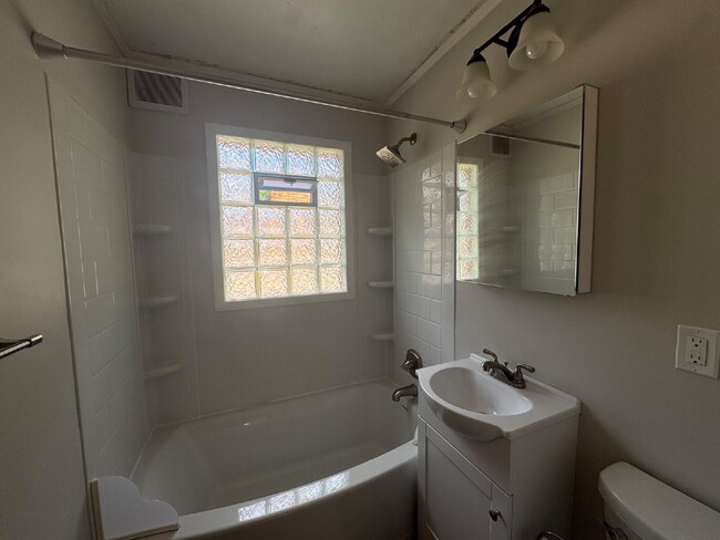 Building Photo - 3BR/1BA in Roseville Featuring A Sprawling Fenced Yard & An Attached Garage