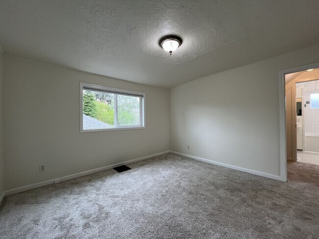 Building Photo - Character-Filled Concordia Home with Flexible Living Spaces & Gas Fireplace