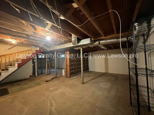 Building Photo - Charming Brick Ranch with Beautifully Landscaped Yard and Attached Carport