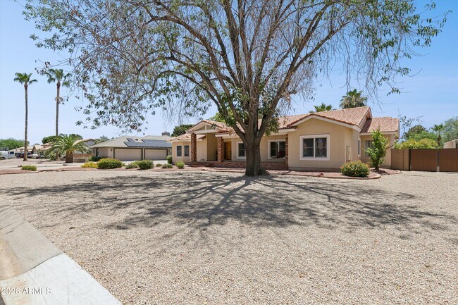 Building Photo - 8611 W Foothill Dr