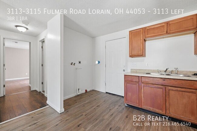 Building Photo - 3113-3115 Fulmer Road Lorain, OH 44053-3113 left