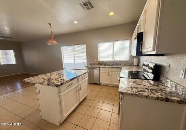 Building Photo - 12524 W Adams St